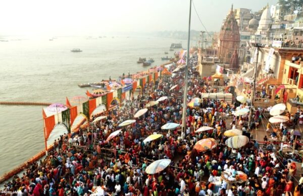 Devotees Take Holy Dip In Ganga In Varanasi For Makar Sankranti